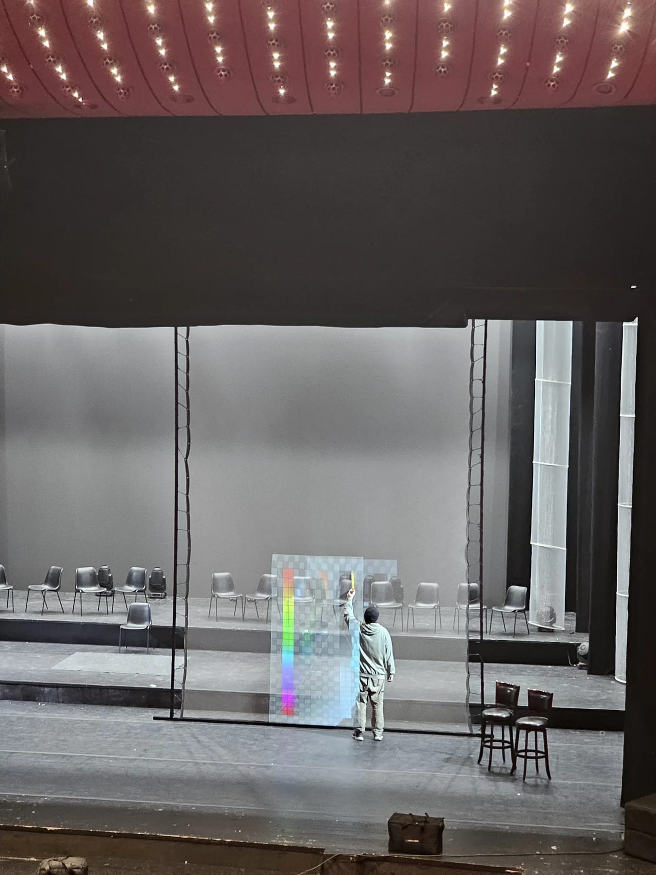 Stage setup for the Gabriel Cotabita tribute at TNB with holographic foil and technical structure.