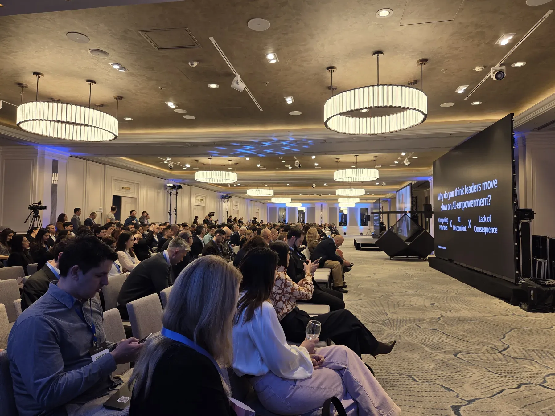 Audience seated in the Marriott Grand Ballroom during the AmCham live hologram experience in Bucharest.