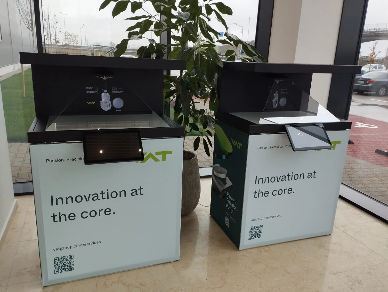 Two Dreamoc XL5 holographic displays with Smart Frame stands and touchscreens installed for VATGroup in Arad.