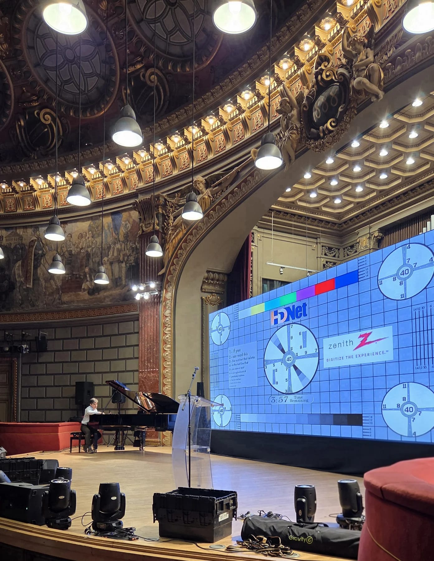 Large event screen installed inside the Romanian Athenaeum for the European Roma Institute event in Bucharest.