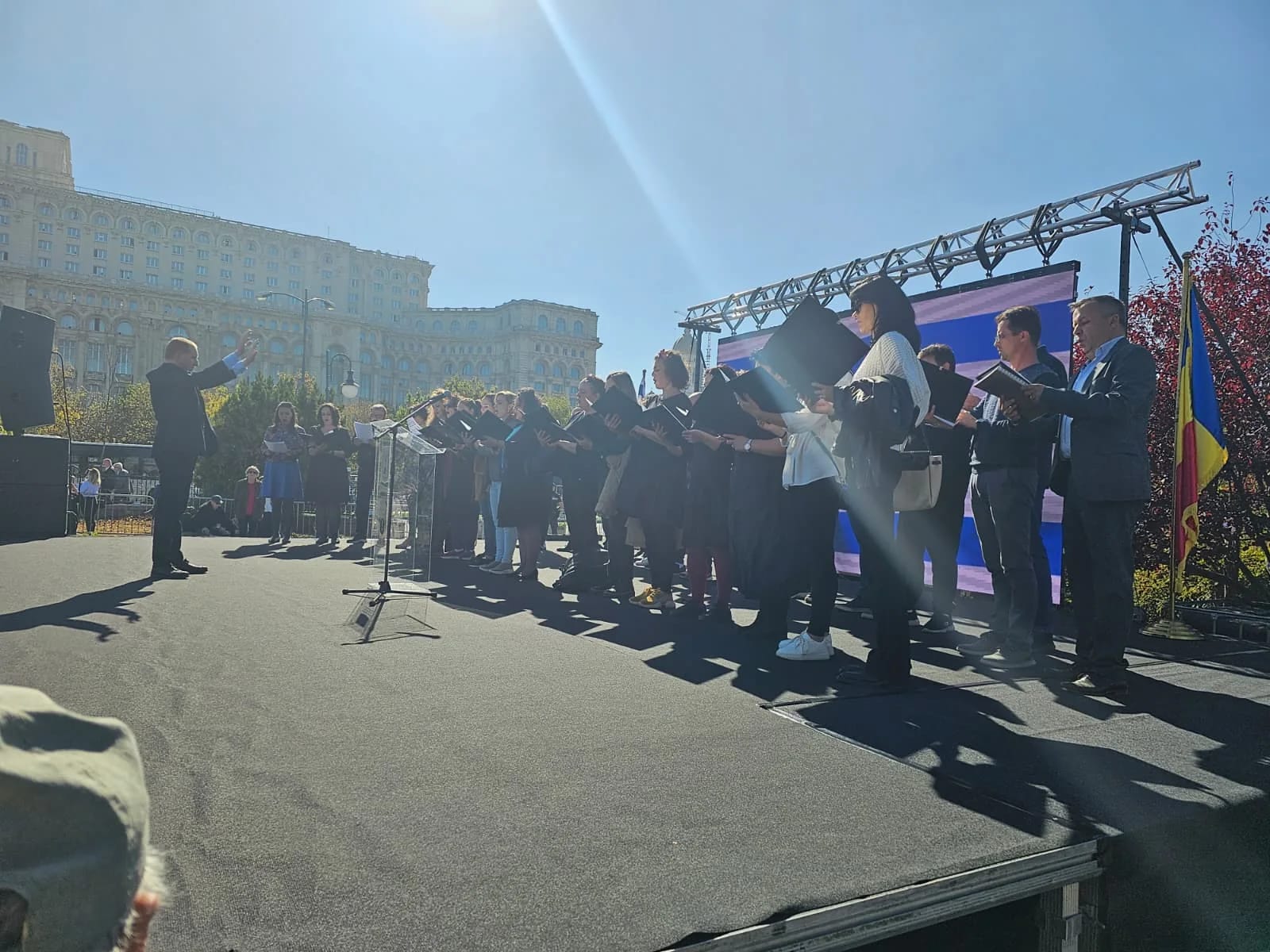 Outdoor stage and guests during Smart Industries Summit in Revolution Square, Bucharest.