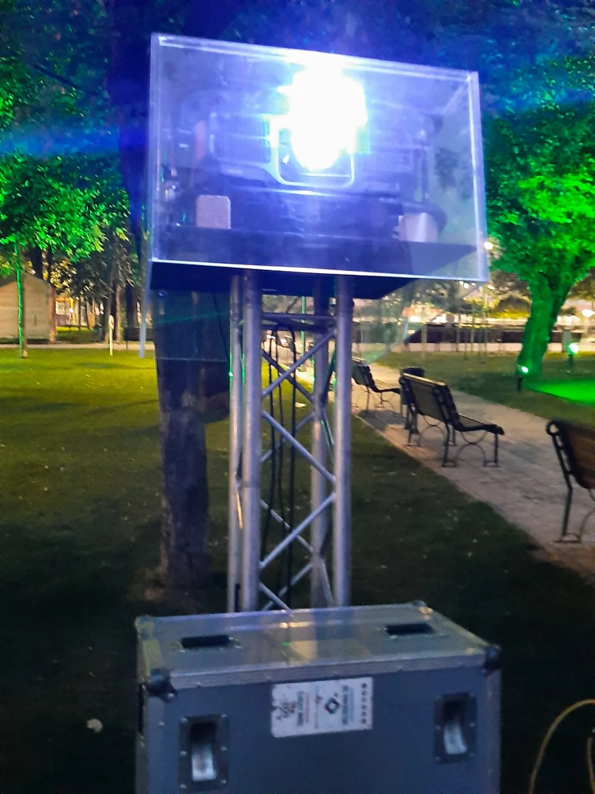 Projector mounted on a truss tower for the Europe Day architectural projection in Bucharest.