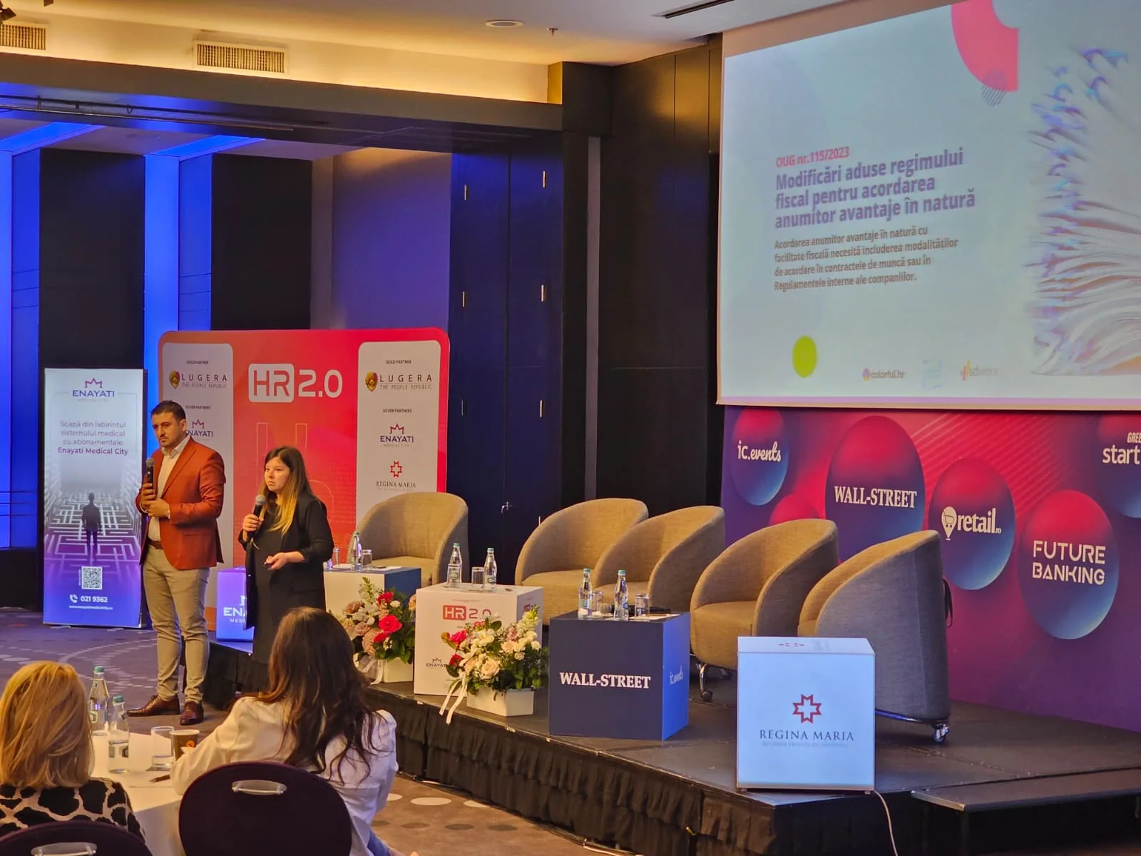 HR 2.0 panel stage with presentation screen and branded event set at Sheraton Bucharest.