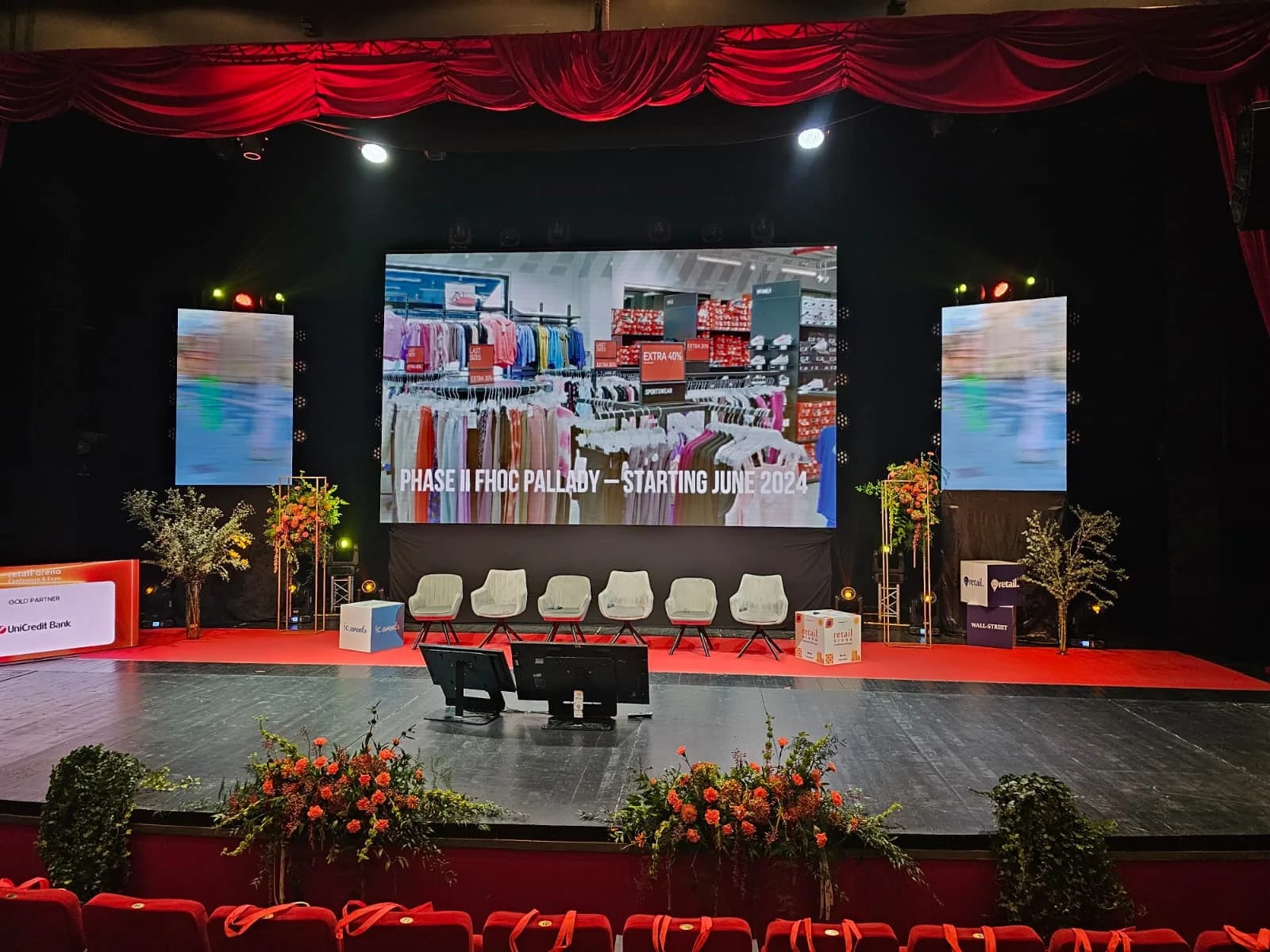 Retail Arena stage with large-format LED content and event lighting during production in Bucharest.