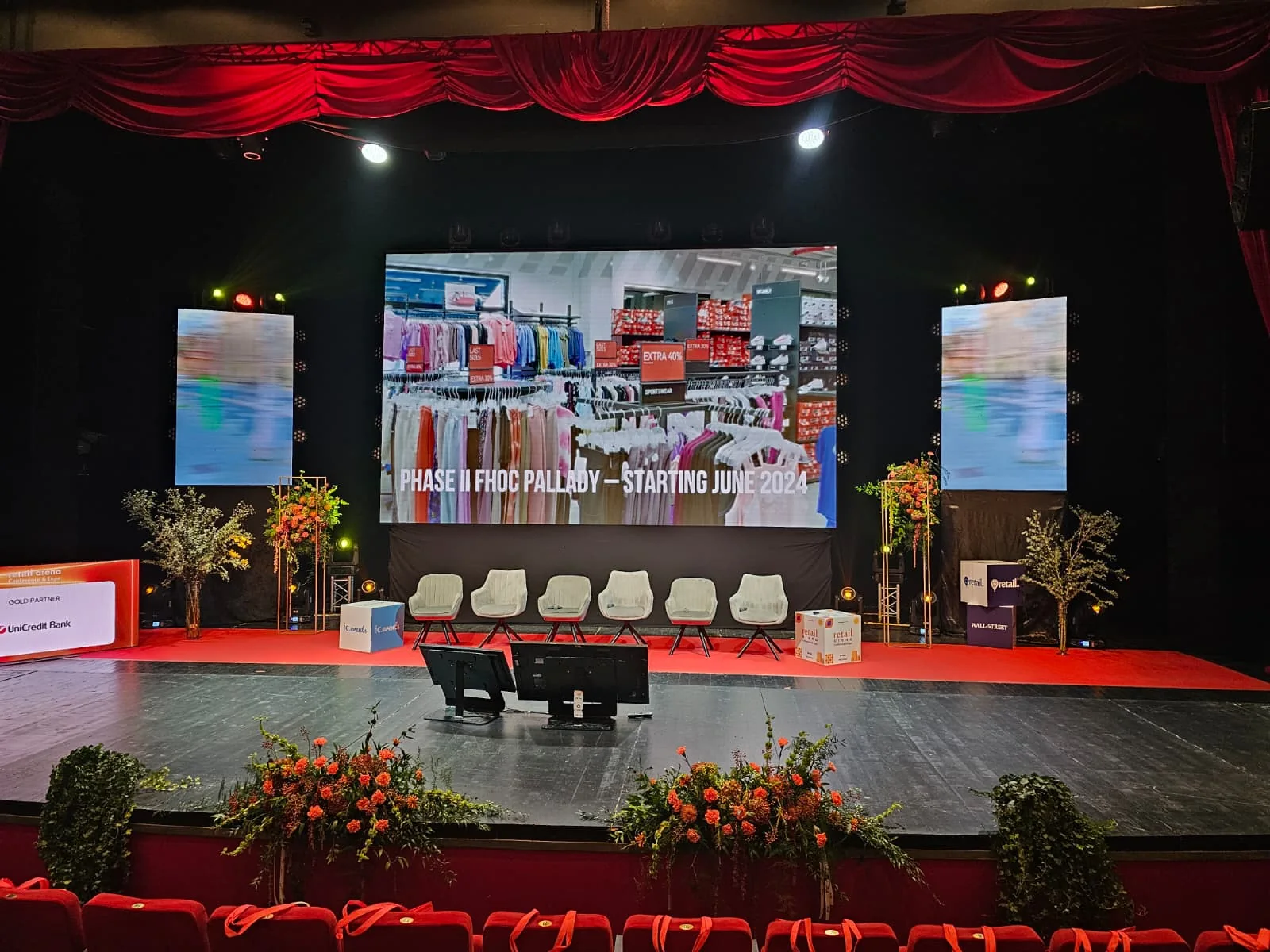 Retail Arena stage with large-format LED content and event lighting during production in Bucharest.