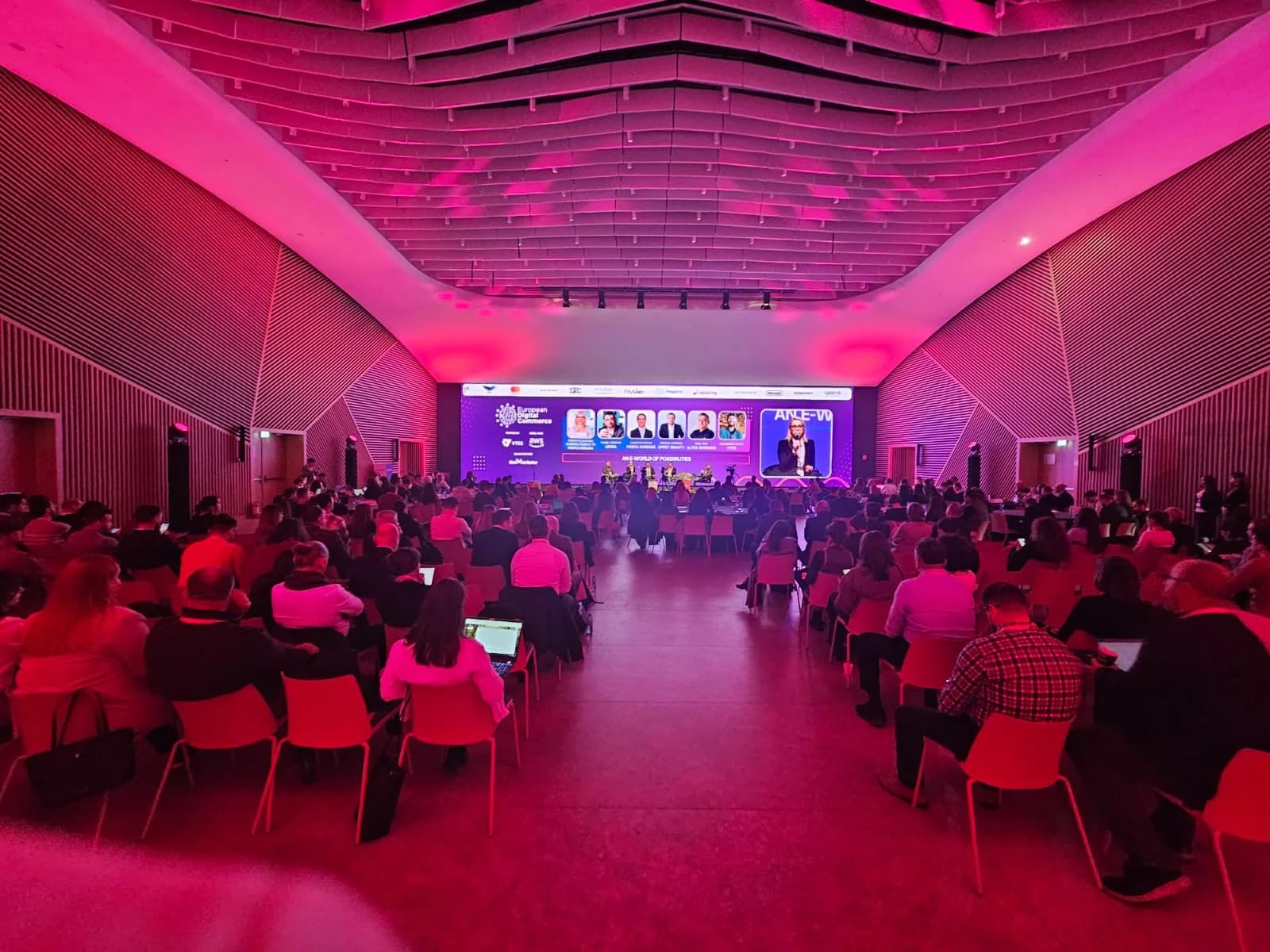 Audience viewing the European Digital Commerce conference stage at Nord Events in Bucharest.