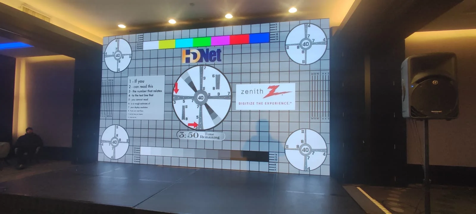 LED wall displaying a calibration test pattern during setup for Digital Banking Scorecard at Sheraton Bucharest.