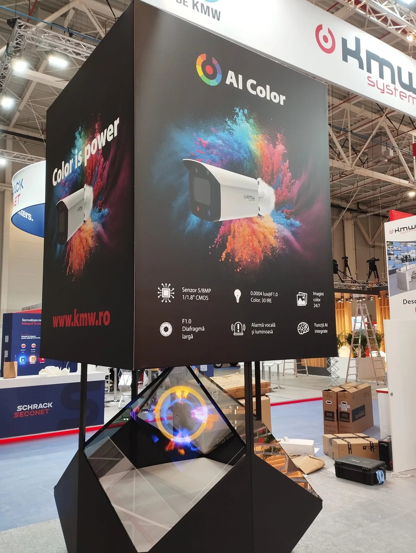 Dreamoc Diamond holographic display showing KMW Systems product content at Romanian Security Fair 2024.