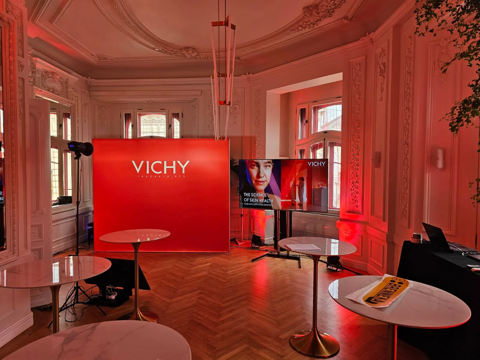 Vichy branded event area at Mitza Biciclista with professional displays and ambient lighting in Bucharest.