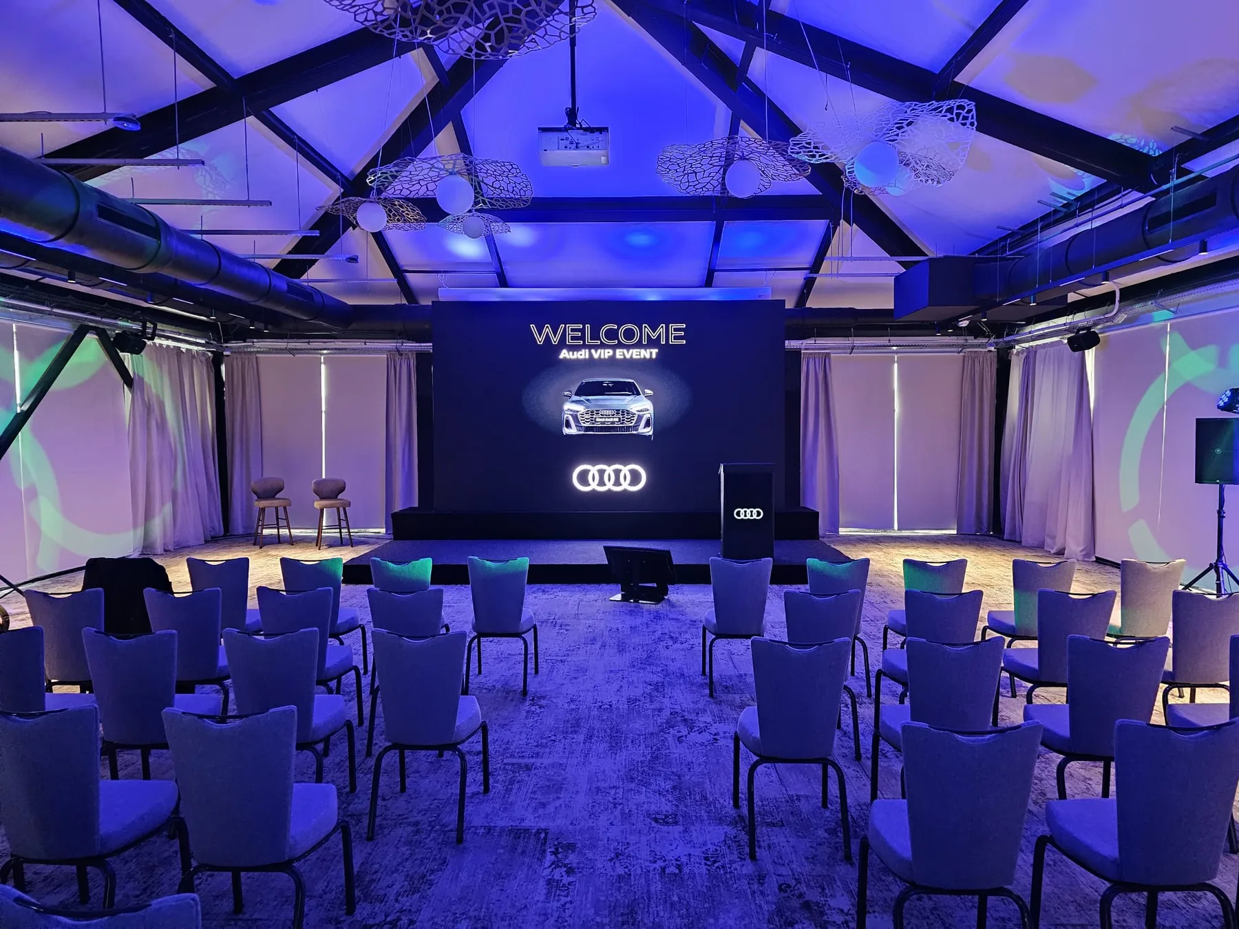 Audi conference stage with screen, lighting and seating for Audi at Conacul Cozieni at Conacul Cozieni in Cozieni.