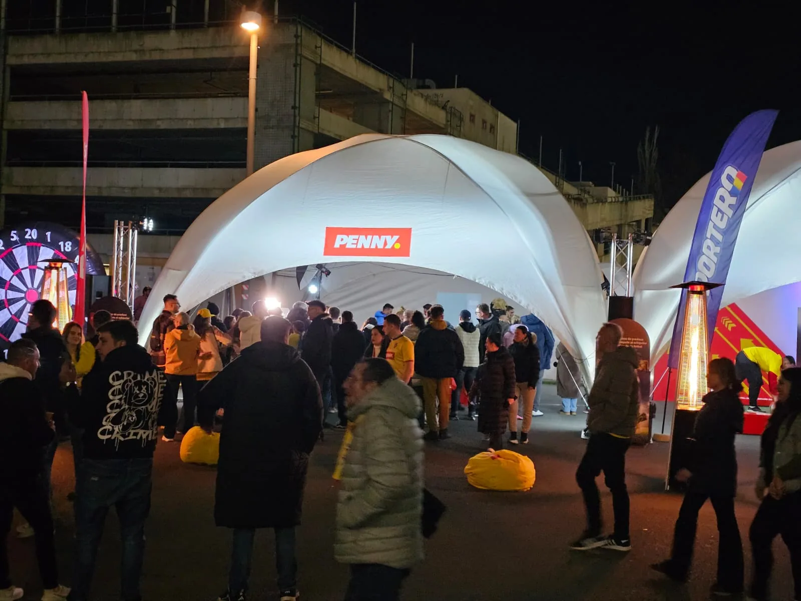 Penny fan-zone dome and audience outside Arena Nationala for Penny Arena Nationala at Arena Nationala in Bucharest.