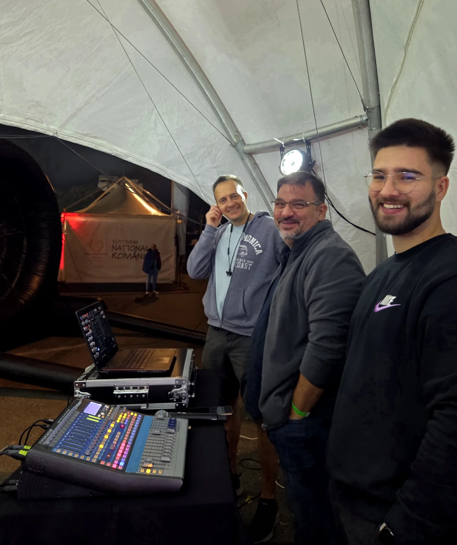 Audio control position and technicians inside the event setup for Penny Arena Nationala at Arena Nationala in Bucharest.