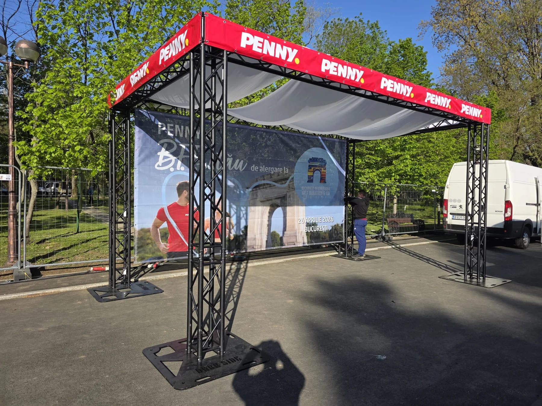 Penny branded event truss structure in Herastrau for Penny Constantina Diță Half Marathon at Herastrau in Bucharest.