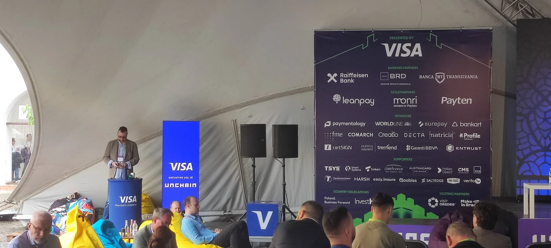 Visa Unchained branded stage and audience area at Cetatea Oradea for Visa Unchained at Cetatea Oradea in Oradea.