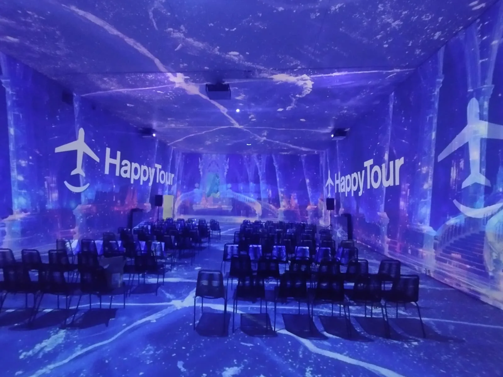 Audience seating inside the Happy Tour projection environment for MINA Museum Event at MINA Museum in Bucharest.