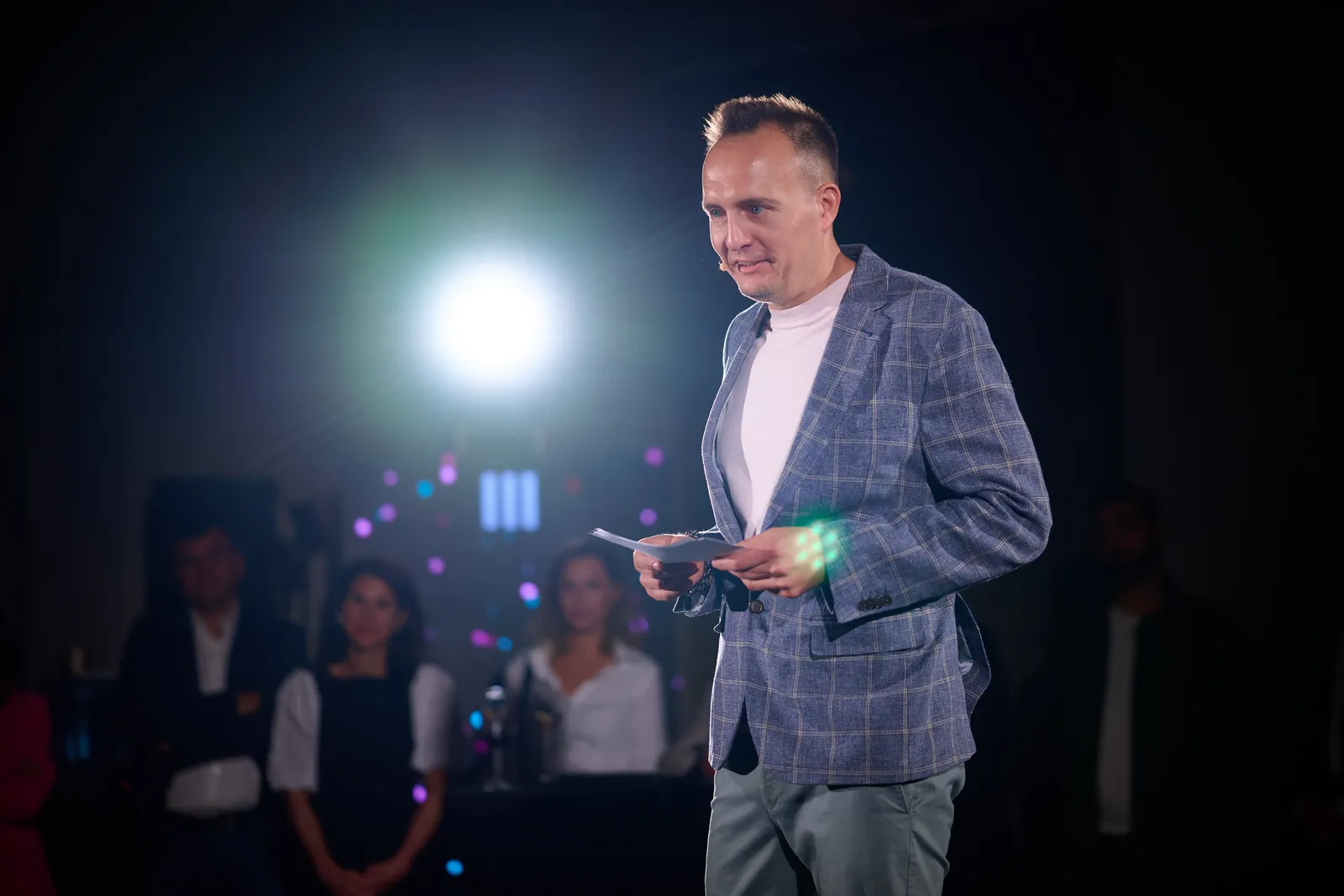 The story of twenty years, told from the round stage under a single spotlight